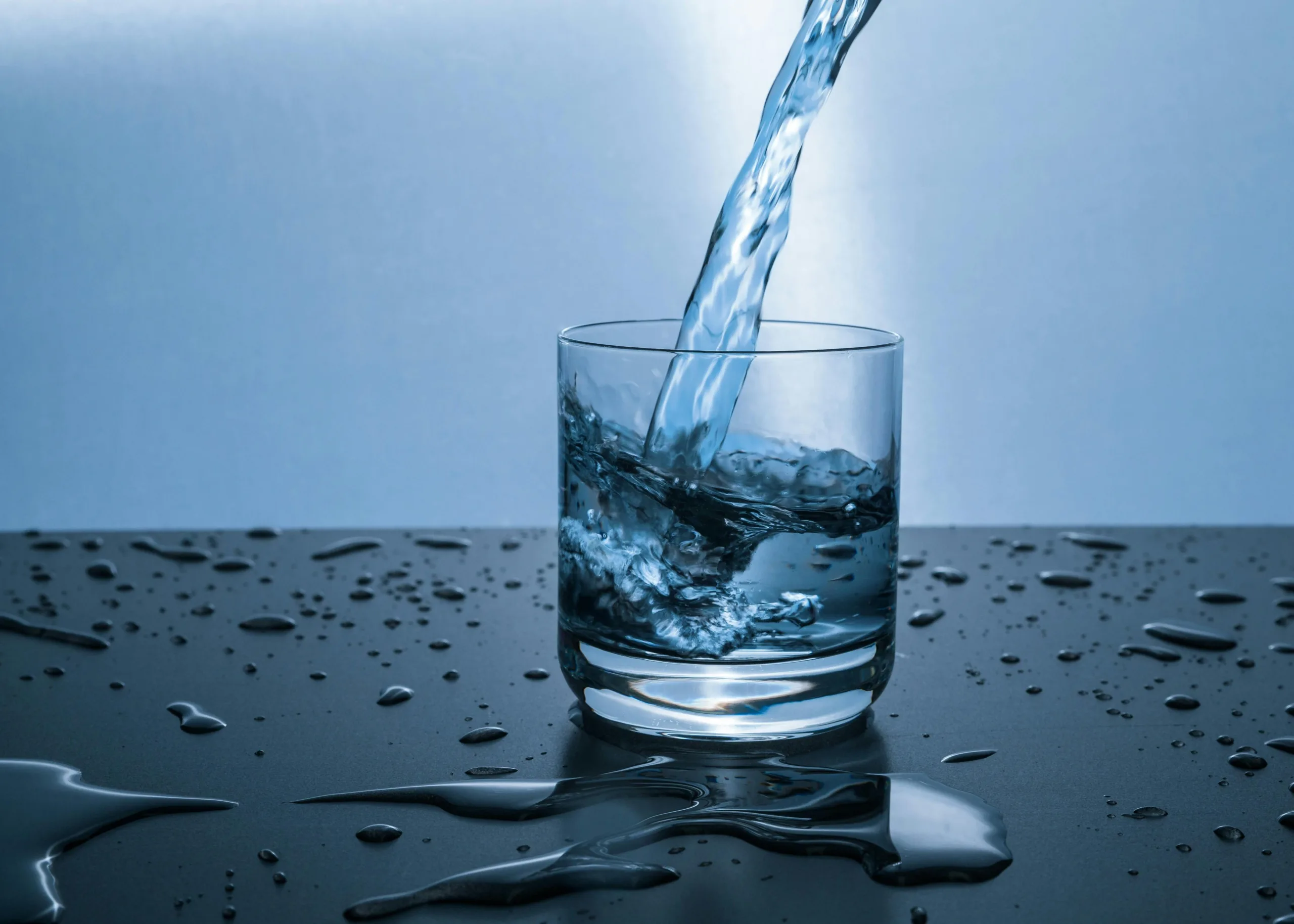 Glass that's being filled with water 