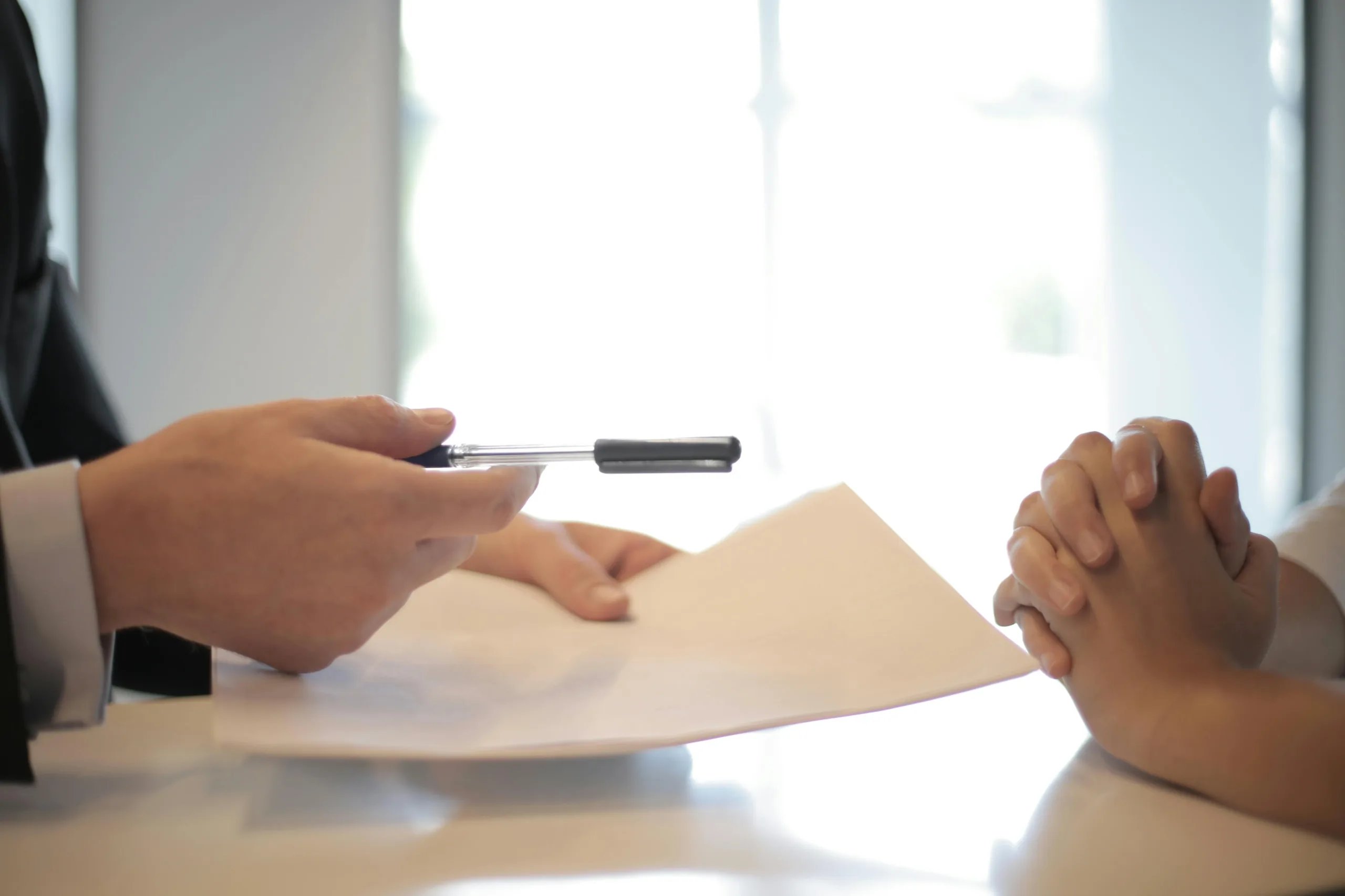 hands holding a paper
